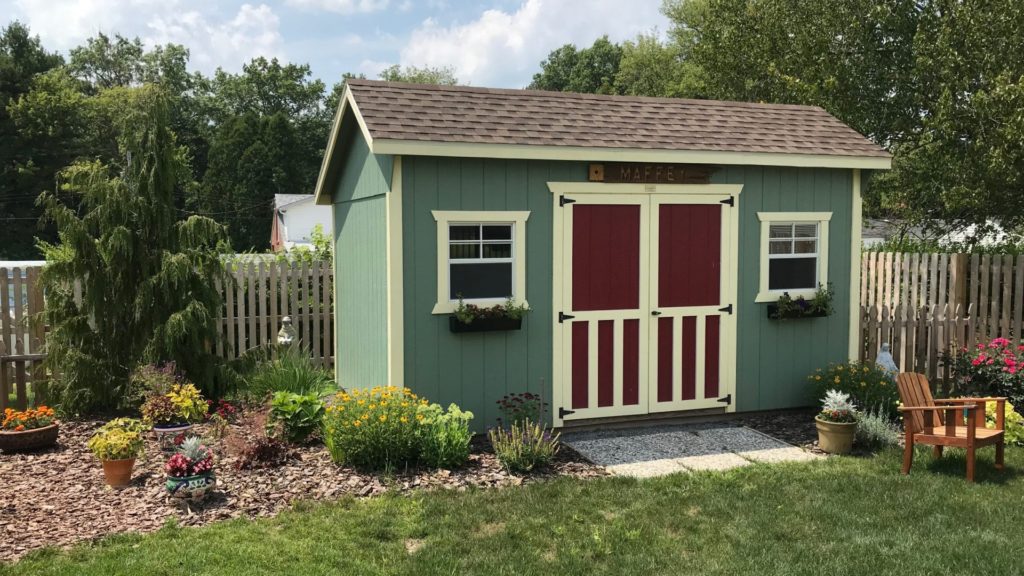 Nice green shed in yard Conneaut OH.
